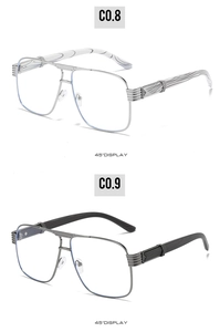 Detail view of square metal eyeglass frames in silver and black with marble temples