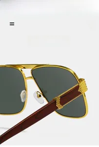 Close-up of luxury pilot sunglasses with gold metal frame and redwood textured temples