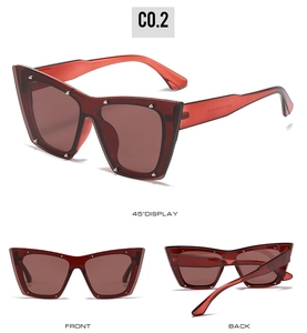 Detail view of burgundy cat-eye sunglasses with silver rivets from three angles