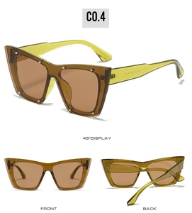 Detailed views of vintage tea-yellow cat-eye sunglasses with silver rivet accents