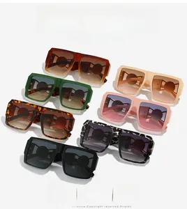 Vista piatta di occhiali da sole quadrati oversize in vari colori alla moda