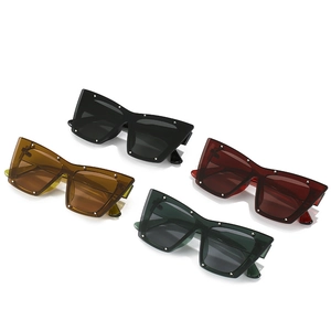 Set of oversized square cat-eye sunglasses with rivets in black, yellow, red and green