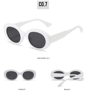 Detailed views of retro oval sunglasses in white frames with dark lenses and wide temples