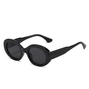 Classic black oval sunglasses with thick frames and dark lenses at a 45-degree angle