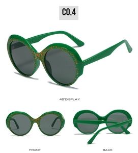 Three-angle views of round green sunglasses with orange speckled patterns and dark lenses