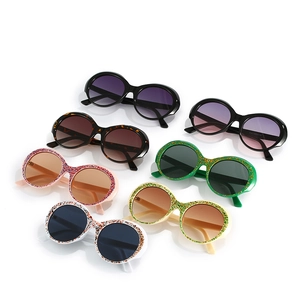 Collection of retro round sunglasses in various glitter and classic frame colors