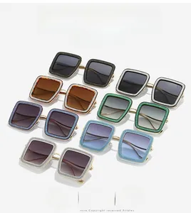 Close-up of stylish square sunglasses in multiple glittery colors and polarized lenses