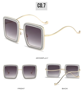 Detailed views of square sunglasses with gold wave temples and gradient purple lenses