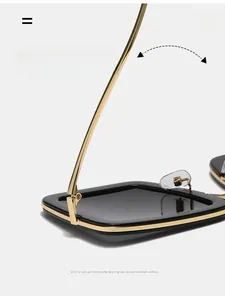 Detail of durable reinforced metal hinge and nose pads on square frame sunglasses