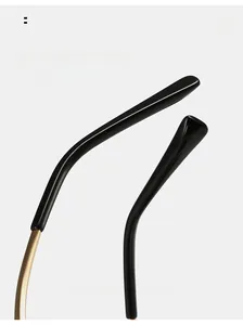 Macro view of curved ergonomic metal temples for comfortable rimless sunglasses