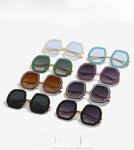 Collection of glitter-encrusted hexagonal sunglasses with metallic bridges in nine colors