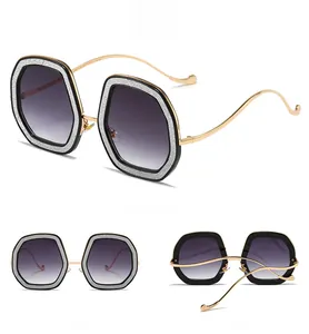 Three-angle view of glitter hexagonal sunglasses with purple gradient lenses and gold wave arms