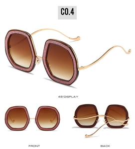 Three views of pink glitter oversized polygon sunglasses with golden metal temples