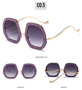 Oval glitter frame sunglasses with gold wavy temples shown in three-view studio display