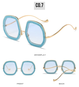 Blue glitter polygon sunglasses with curved golden metal temples in multi-angle views