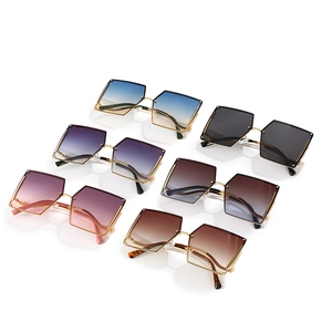 Frameless rhinestone sunglasses with geometric metal frames and gradient lenses