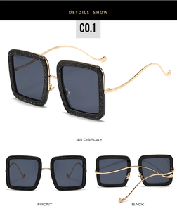 Black glitter square sunglasses with thin gold wavy temples shown from multiple angles