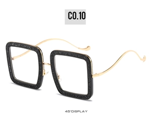 Detailed 45-degree view of square glitter sunglasses with elegant gold metal temples