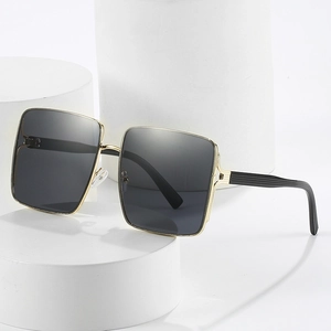 Classic black and gold oversized square sunglasses with minimalist metal frame for women