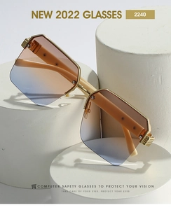 Gros plan sur des lunettes de soleil carrées à demi-monture avec verres dégradés bleu-orange