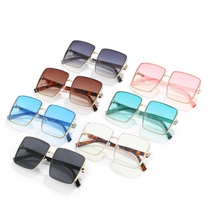 Fashionable oversized square metal sunglasses collection with various gradient lens colors