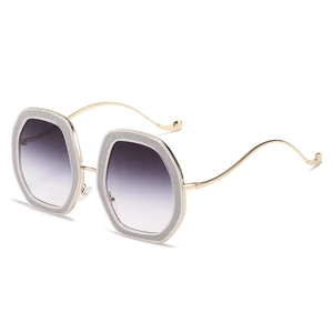 Lunettes de soleil rétro géométriques avec monture pailletée et branches ondulées