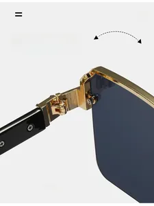 Détail de la charnière en métal doré durable sur des lunettes de soleil carrées
