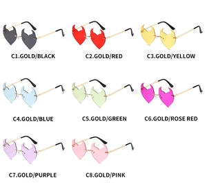 Detailed view of devil-horn heart-shaped rimless sunglasses in eight vibrant lens colors