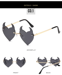 Detailed views of heart-shaped devil horn sunglasses with frameless lenses and gold metal temples