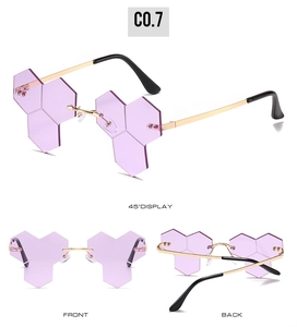 Three views of rimless purple honeycomb sunglasses with gold metal temples and sharp geometric shape