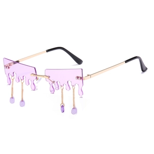Lunettes de soleil sans monture violettes avec pampilles dorées en forme de gouttes