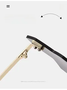 Macro view of durable gold metal hinge on rimless sunglasses for long-lasting use