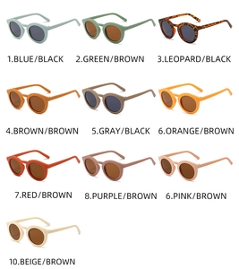 Collection of vintage round sunglasses in ten assorted frame colors on a white background