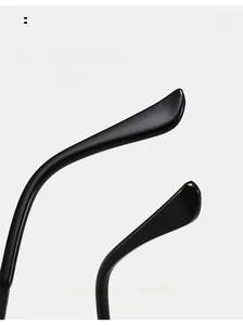 Detail of curved black mirror legs designed for comfortable ear fit on sunglasses