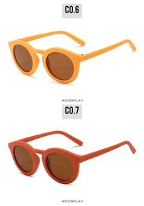45-degree display of vintage round kids sunglasses in bright orange and dark red