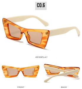 Vue sous trois angles de lunettes de soleil œil-de-chat orange avec branches blanc crème