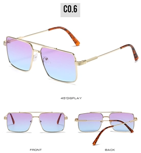 Detail of square sunglasses featuring woven gold metal temples and gradient blue-purple lenses