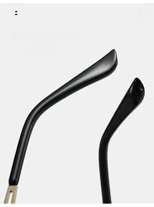 Detail of curved glossy sunglasses legs with metallic decoration for comfortable wear