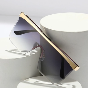Oversized square shield sunglasses with purple gradient lenses and gold metal frame