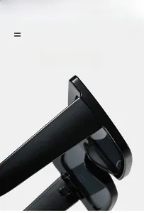 Detail view of glossy black oversized sunglasses frame with lightweight flexible material