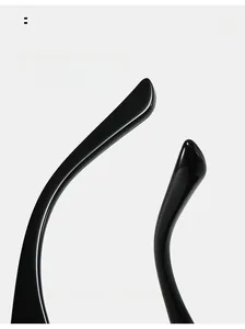 Detail of glossy black curved sunglasses legs showing ergonomic comfort design