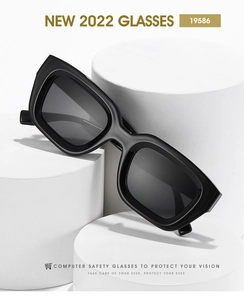 Detail of square black frame glasses on white pedestals highlighting high-end minimalist design