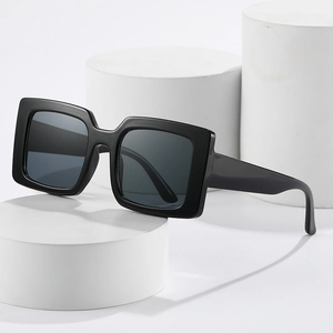 Classic large square frame sunglasses with black glossy finish and dark grey lenses