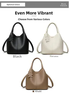 French style bucket bags in black, beige, and khaki with lychee grain leather detail