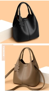 Detail of lychee pattern leather and bear charm on French bucket tote bags