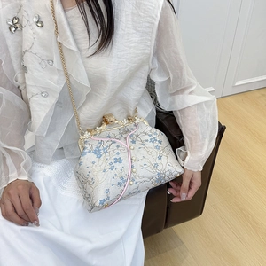 Vintage white floral embroidered handbag with pearl clasp and gold chain strap