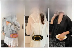 Chic oval chain bag with gold C-handle shown in pink, black, and white colors