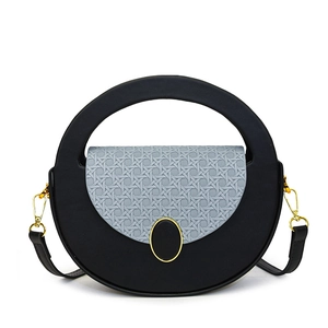 Retro round shoulder bag with black-grey contrast weave and golden hardware detail
