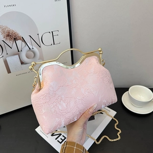 Pink embroidered shell handbag with gold metal handle and chain strap for women