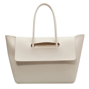 Minimalist cream white leather tote bag with unique top handle hole and flap closure